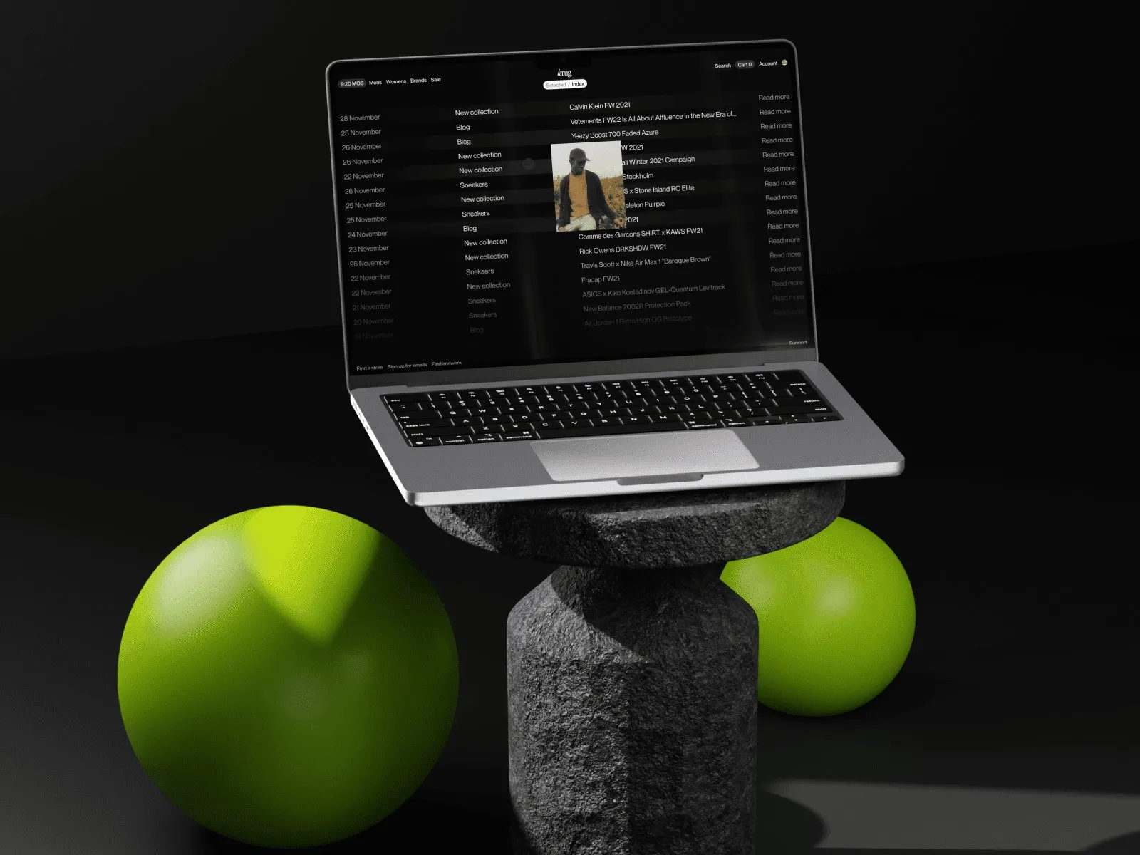 Laptop showing the platform's home page on a stone plinth between two green spheres