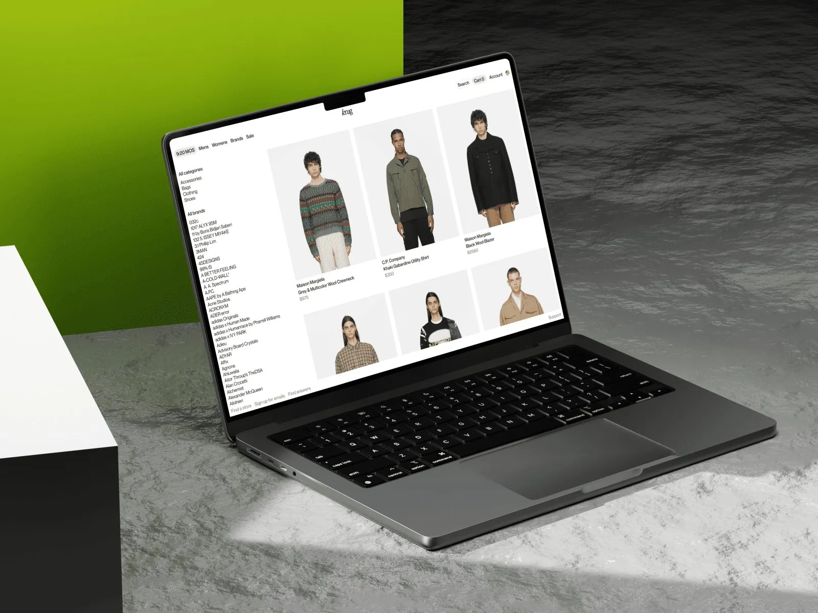 Laptop with the product catalogue page on a marble surface